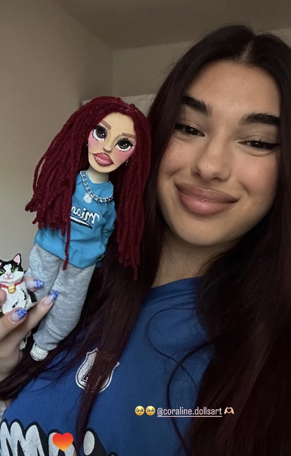 Client with custom doll and mini pet